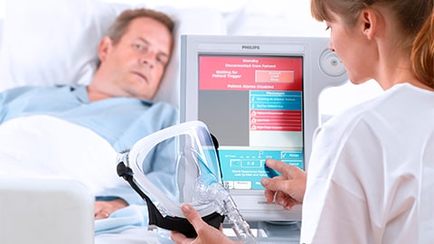 Adult patient being examined with V60 ventilator
