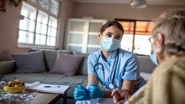 nurse talking to a patient